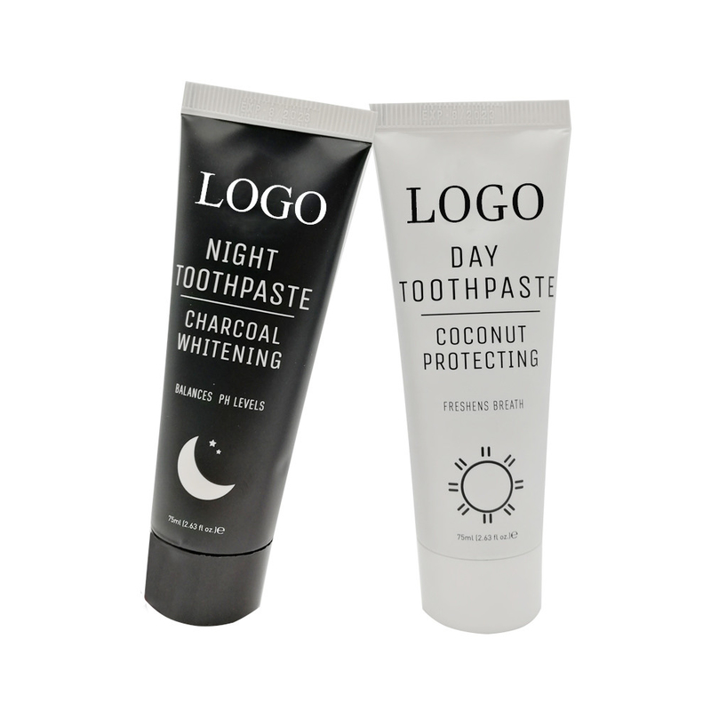 Dientes libres del fluoruro que blanquean el carbón de leña negro de la goma blanca del coco de la crema dental día y noche