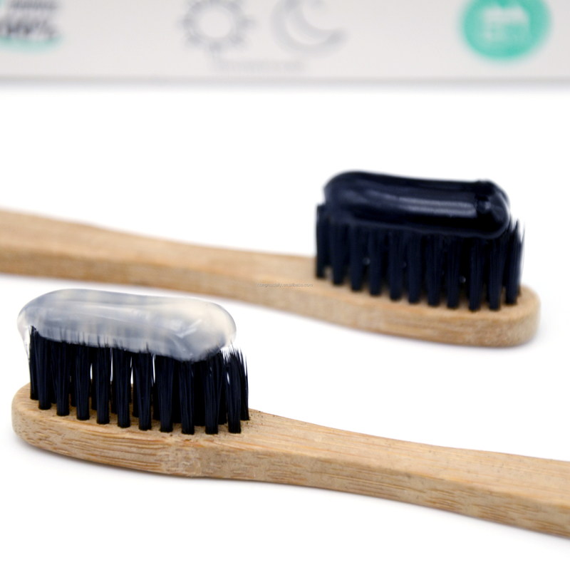 Dientes libres del fluoruro que blanquean el carbón de leña negro de la goma blanca del coco de la crema dental día y noche