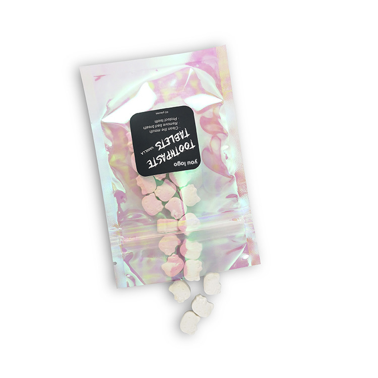 La crema dental orgánica de la menta del tamaño que cuece regular hace tabletas las píldoras que blanquean a adulto oral del viaje