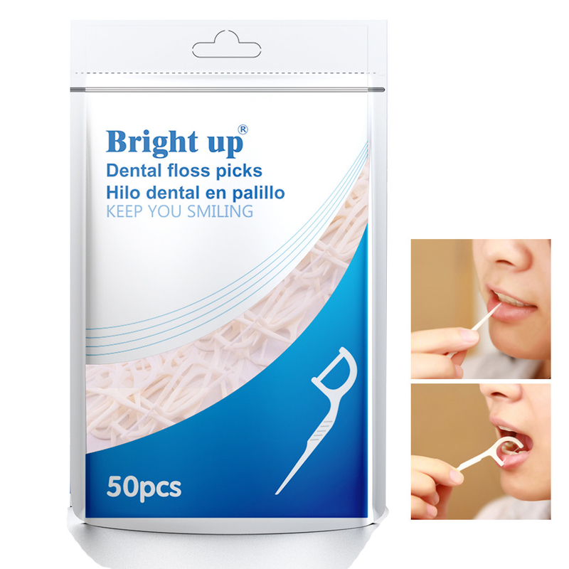 La caja biodegradable herbaria de la seda dental o la seda dental escoge cuidado oral le guarda sonrisa