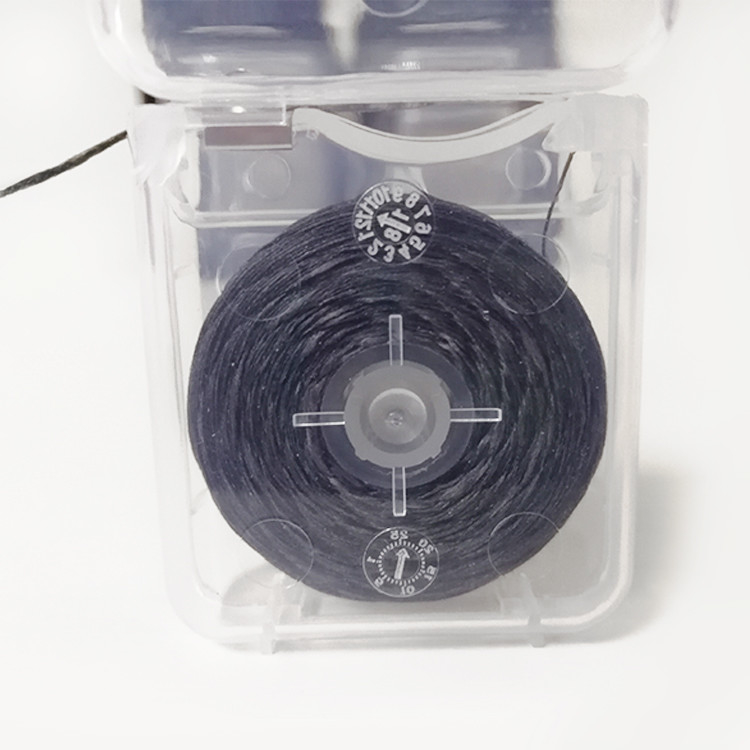 Sabor material de nylon portátil de la menta de 50 metros de la seda dental del carbón de leña del bambú de la etiqueta privada