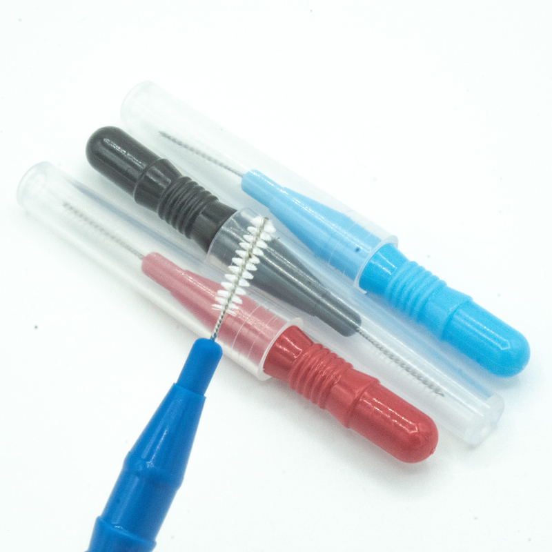 Cuidado oral encajonado palillo colorido del cepillo interdental que limpia para el hogar