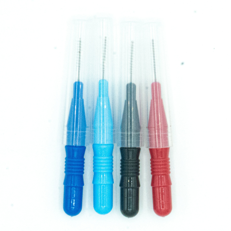 Cuidado oral encajonado palillo colorido del cepillo interdental que limpia para el hogar