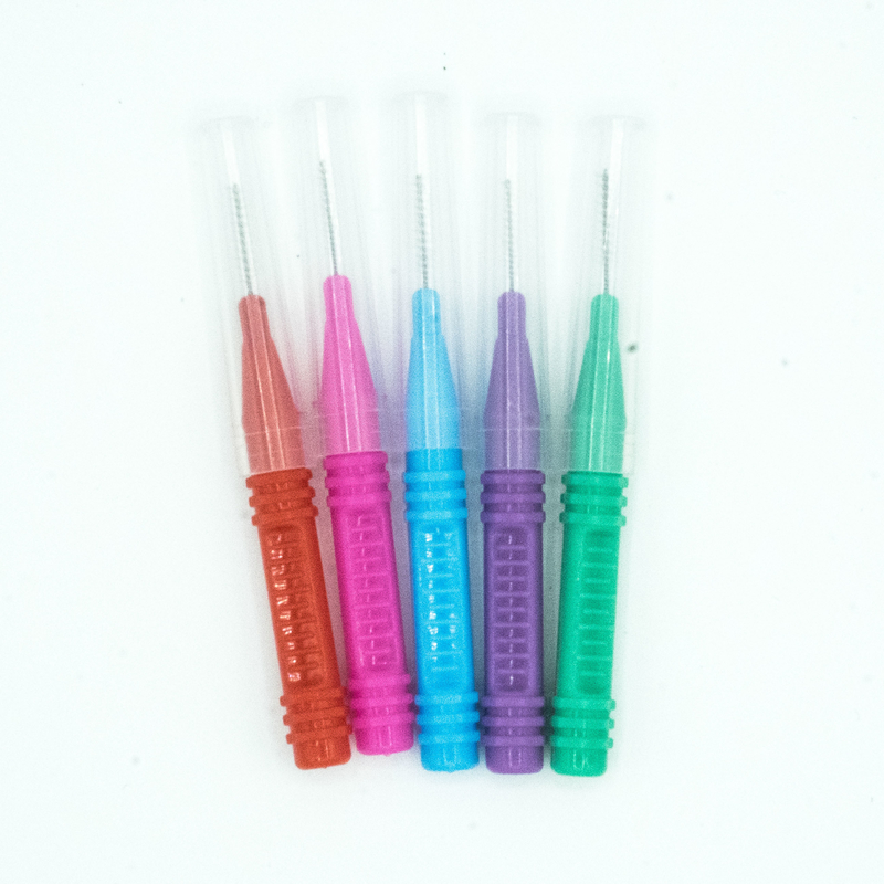 Cuidado oral encajonado palillo colorido del cepillo interdental que limpia para el hogar
