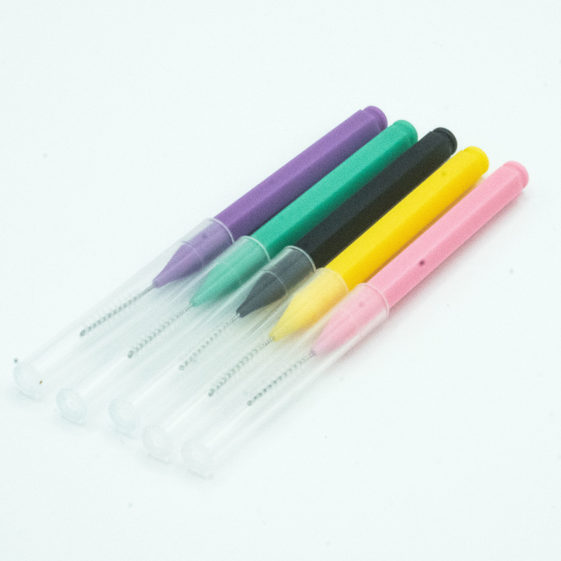 Cuidado oral encajonado palillo colorido del cepillo interdental que limpia para el hogar