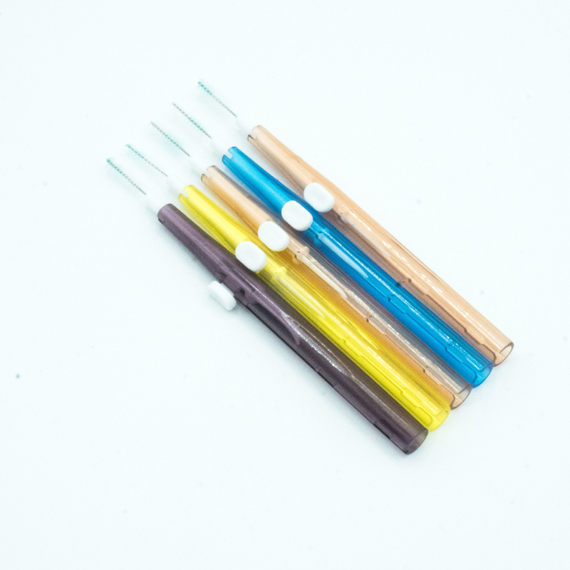 Cuidado oral encajonado palillo colorido del cepillo interdental que limpia para el hogar
