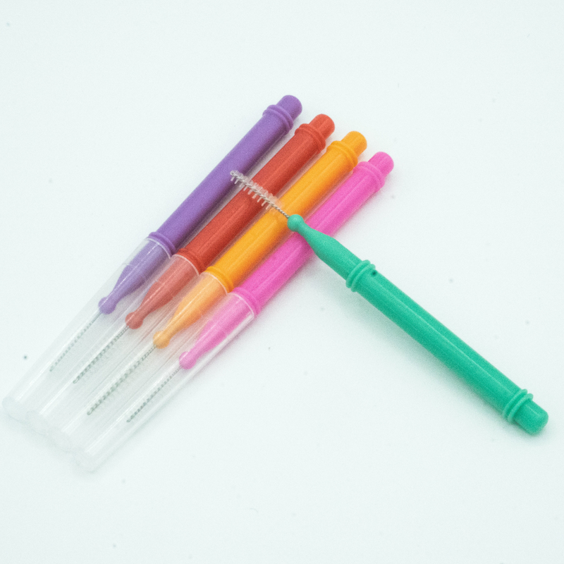 Cuidado oral encajonado palillo colorido del cepillo interdental que limpia para el hogar
