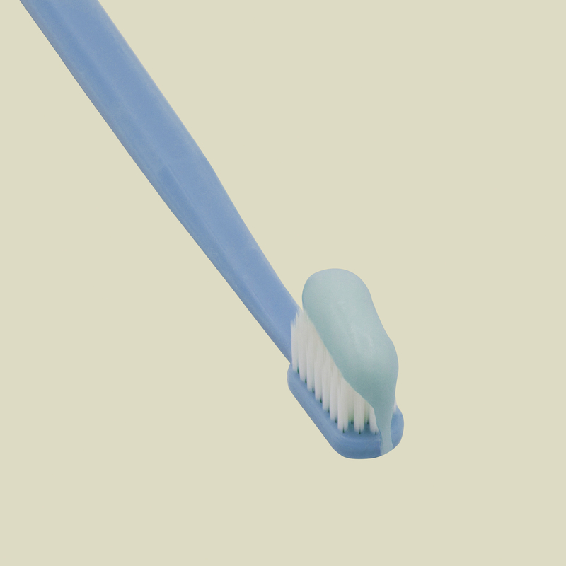 La pasta de dientes con sabor a flor para blanquear los dientes con sorbitol de sílice de 400 g de papel blanco en caja de tubos