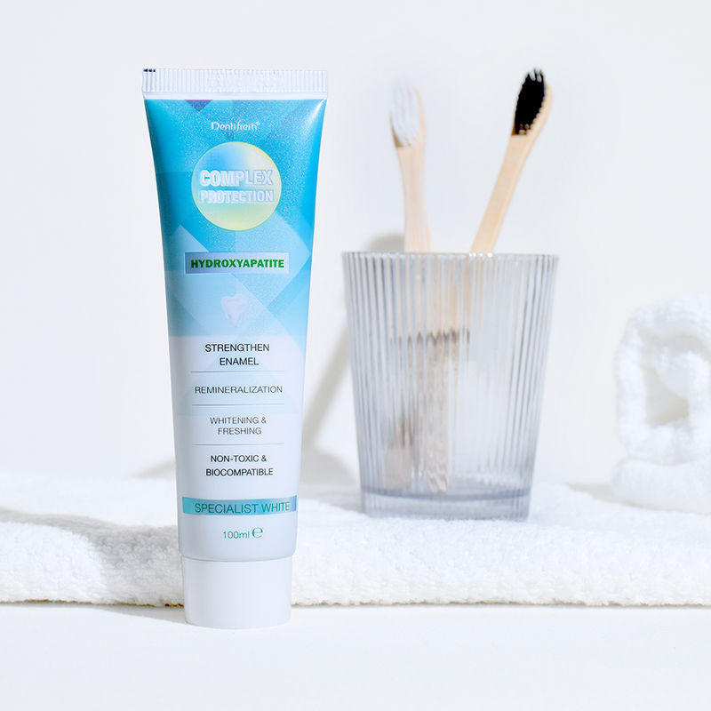 Efecto blanqueador moderado Dientes Pastas dentales blanqueadoras con cepillo de dientes dos veces al día e ingredientes de fitato sódico